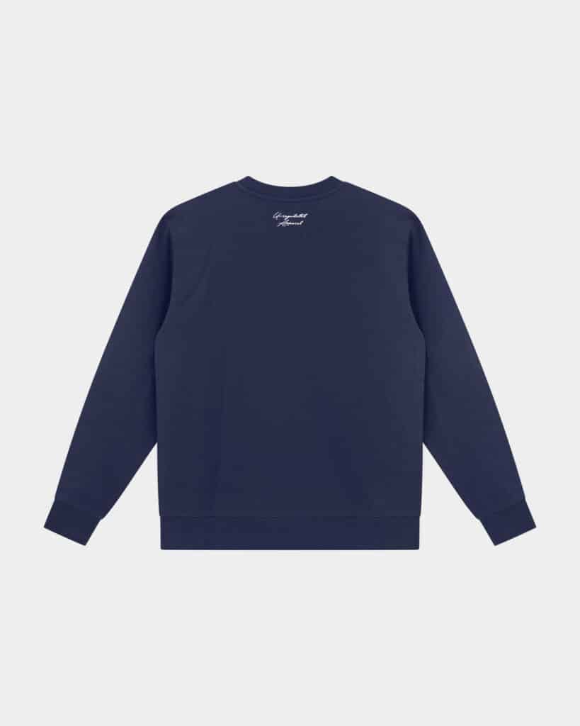 Signature Sweater Navy - Last Bucks The Signature Sweater in Navy, back view with knitted neck logo