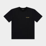 The Script Tee Jet Black - Black t-shirt front view with a small gold “Last Bucks” script logo on the left chest