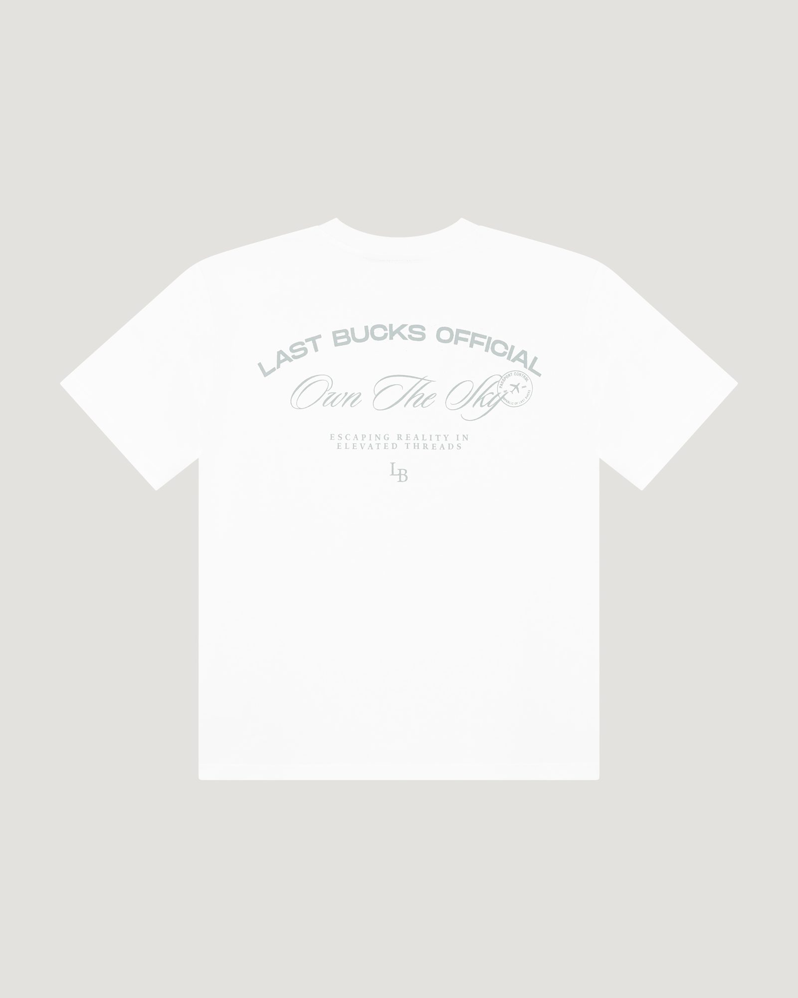Back of the Own The Sky tee in white, the print that follows Uncaged Birds