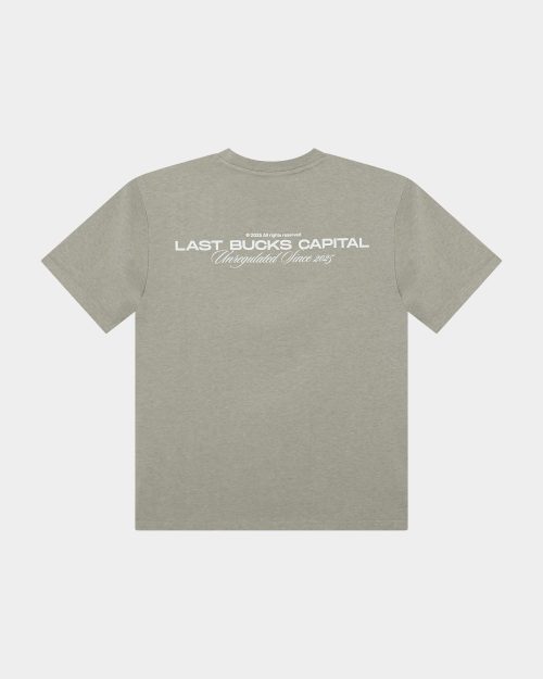Back product photo of The Capital Tee in Mari Grey with a large “LAST BUCKS CAPITAL” back print and “Unregulated Since 2025” script